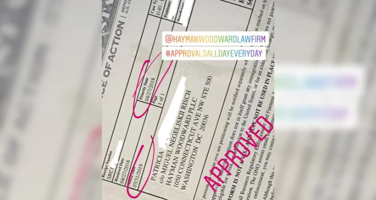 Foto do documento mostrando aprovação do I140